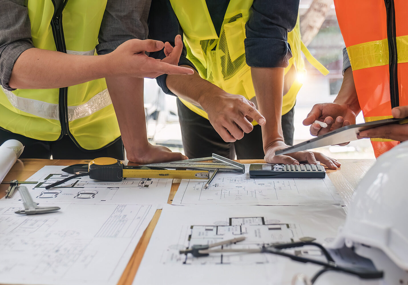 Engineer,Teamwork,Meeting,,Drawing,Working,On,Blueprint,Meeting,For,Project Engineer Teamwork Meeting, Drawing working on blueprint meeting for project working with partner on model building and engineering tools in working site, Construction and structure concept..